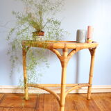 Half-moon rattan console