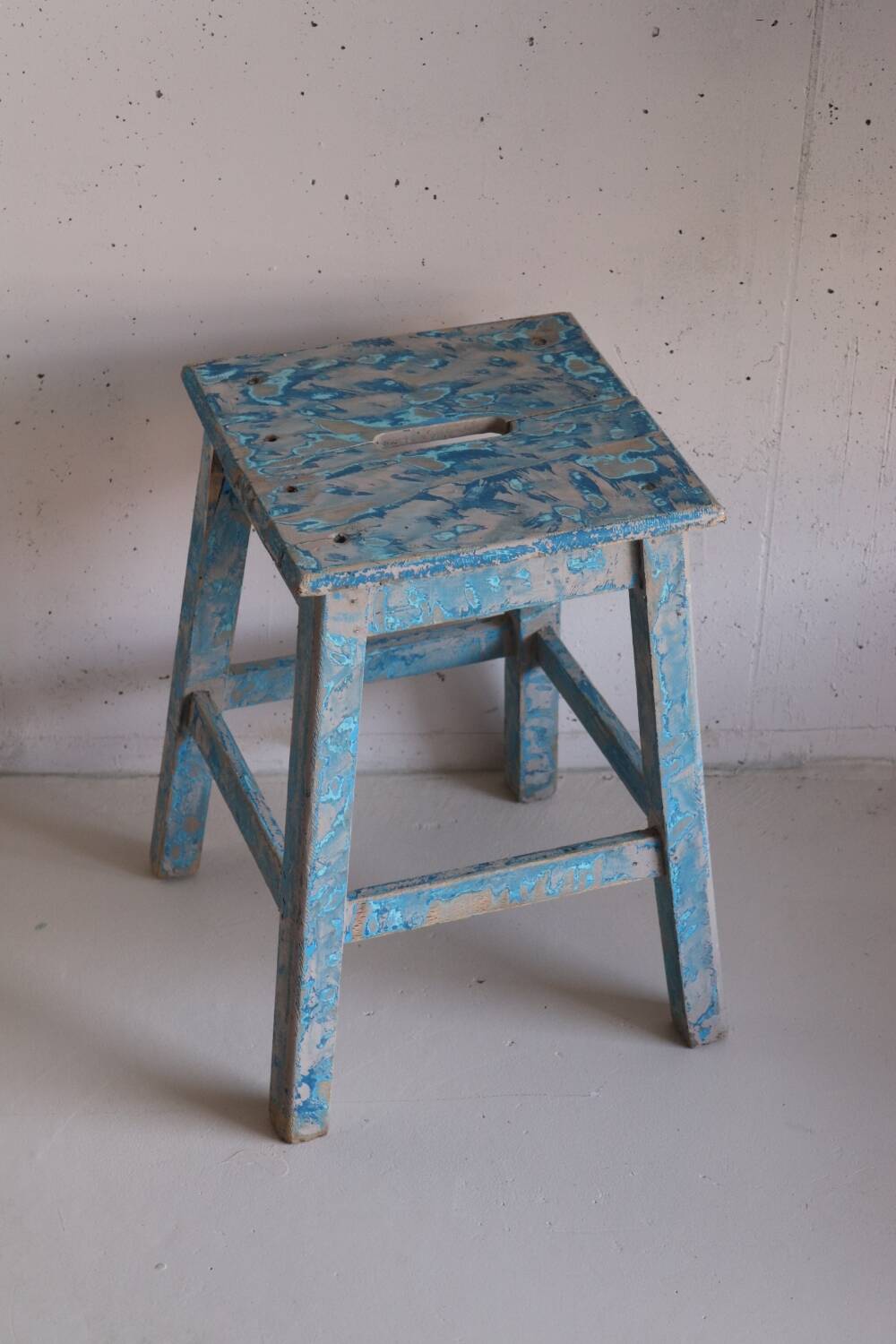 Blue patinated farm stool