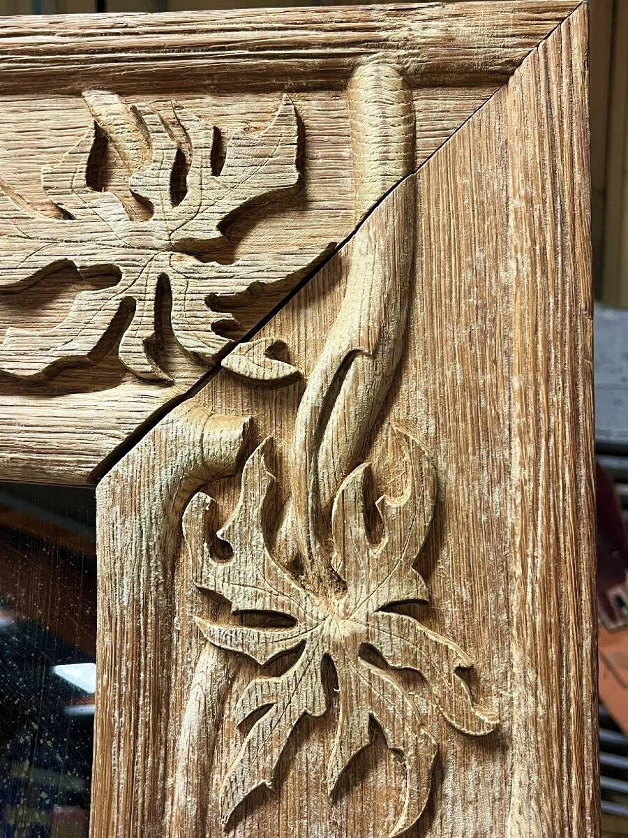 Art Nouveau mirror decorated with poppy leaves, signed by Roger père.