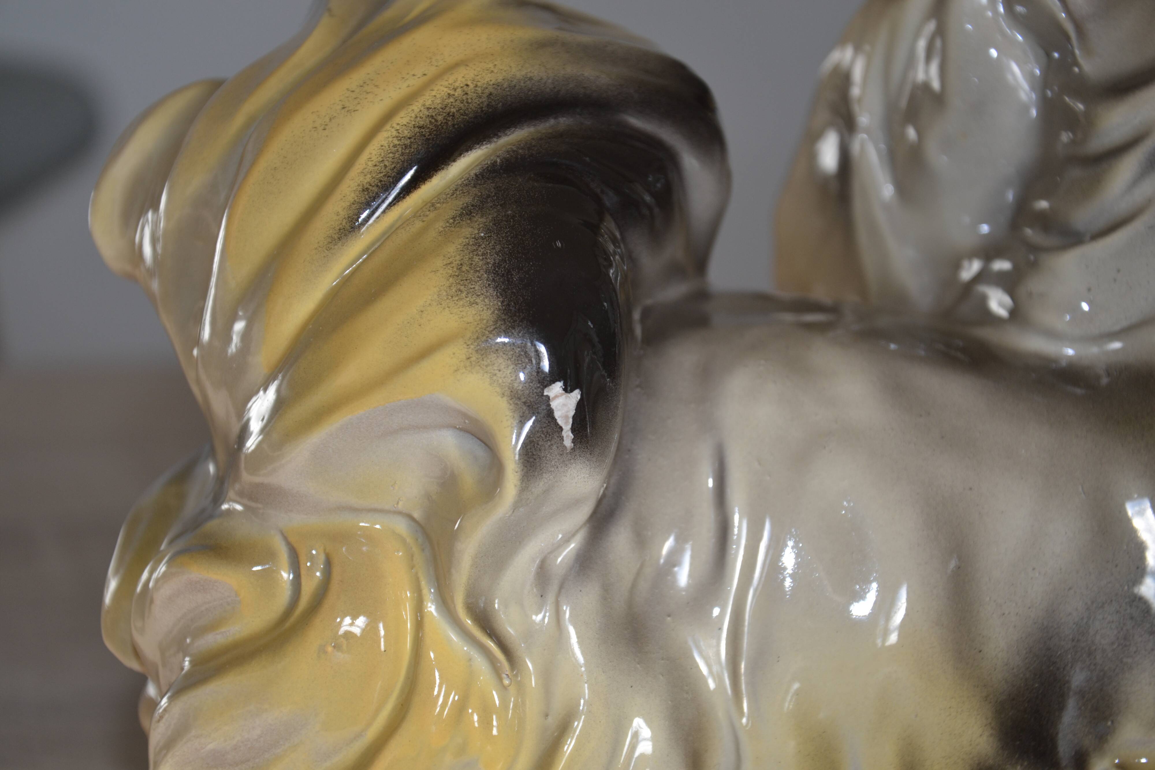 Ceramic dog sculpture from the 1940s-50s.