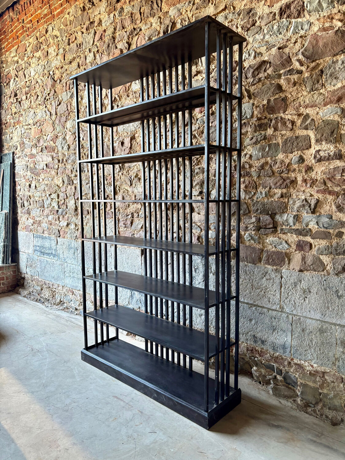 Large industrial black metal shelf – openwork graphic structure