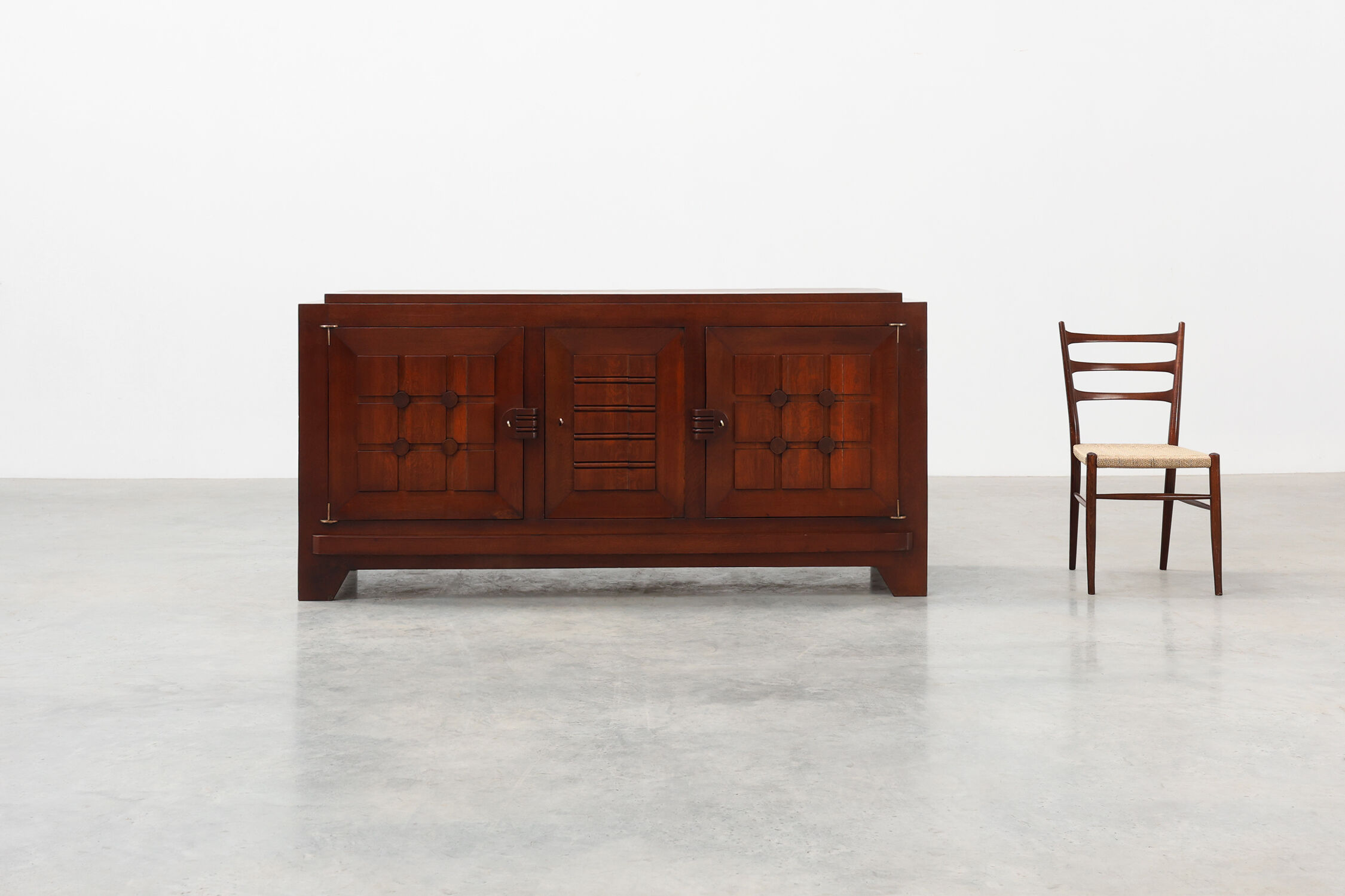 Art Deco carved geometric sideboard by Charles Dudouyt in oak, France ca. 1