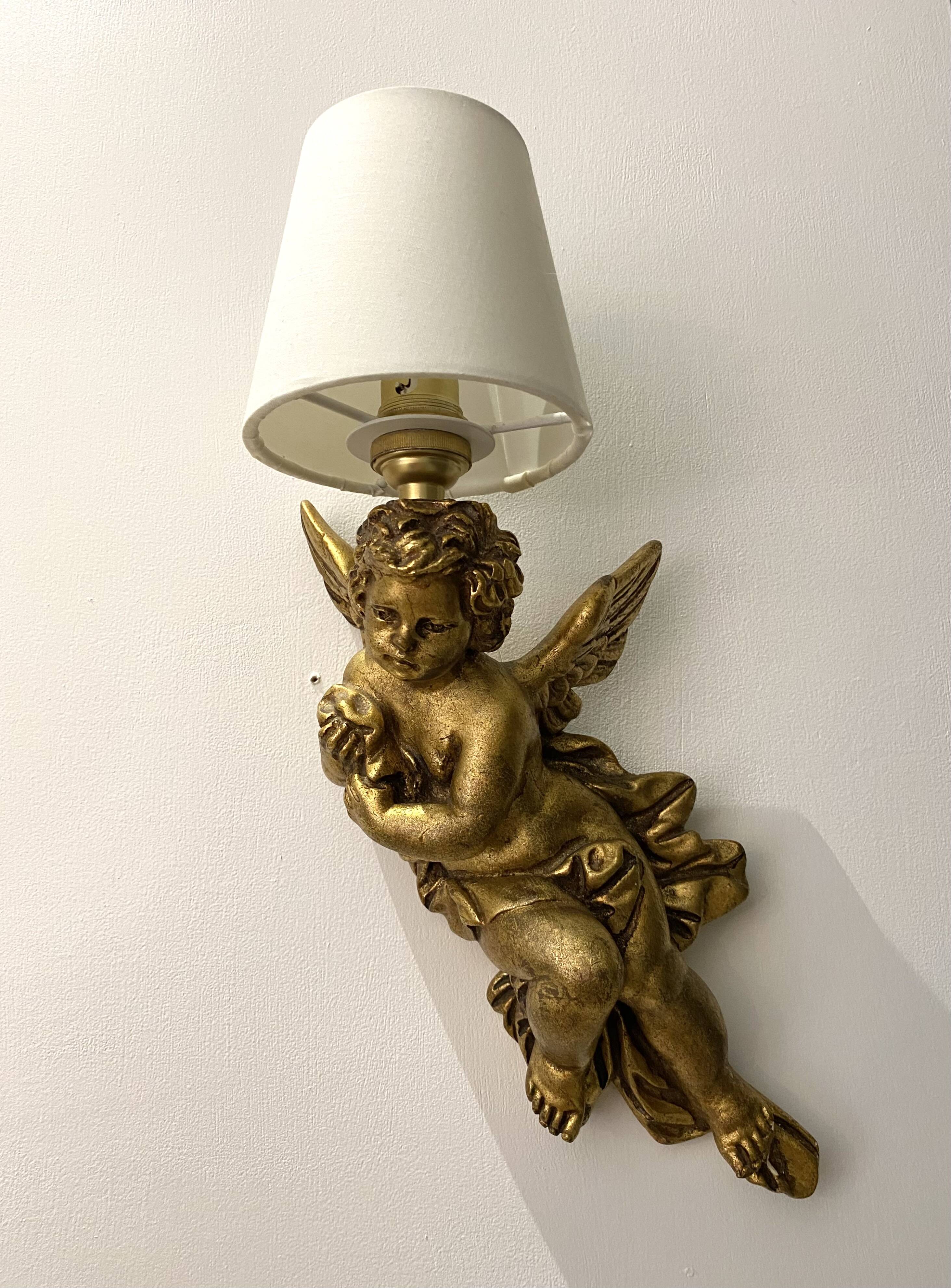 Pair of golden Puttis wall lights