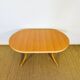 Vintage oval dining room table with extension