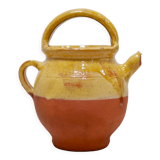 Old gargoulette pot in glazed terracotta