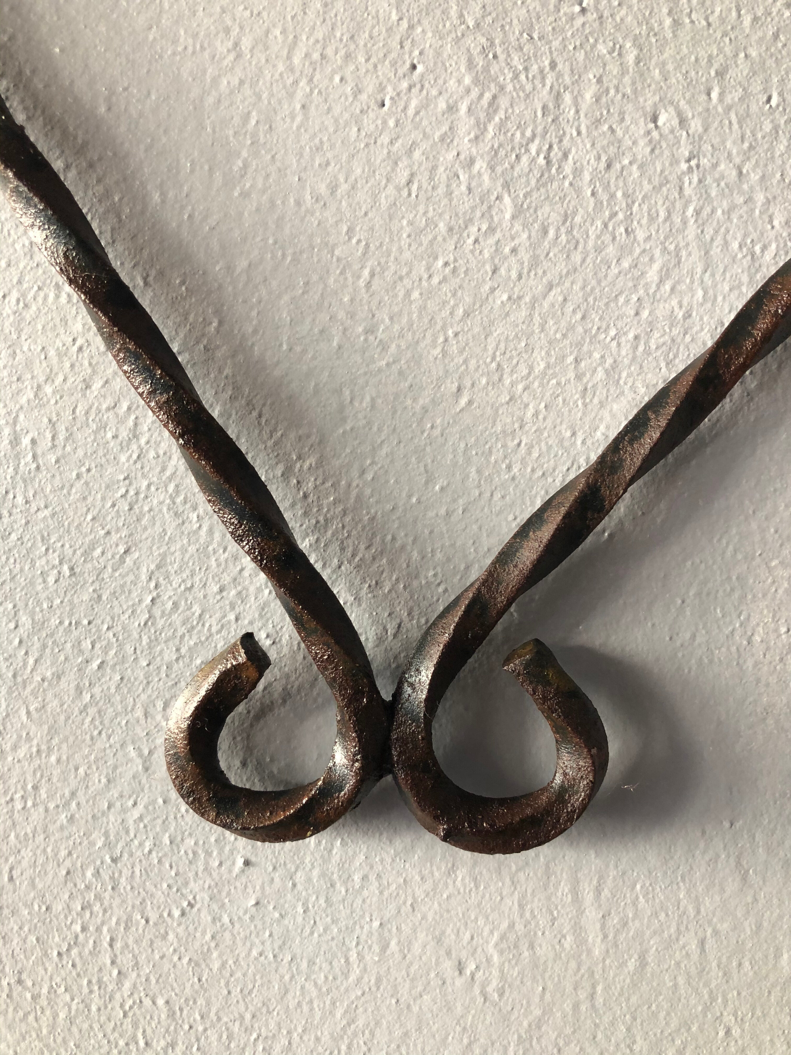 Wrought iron wall plant holder