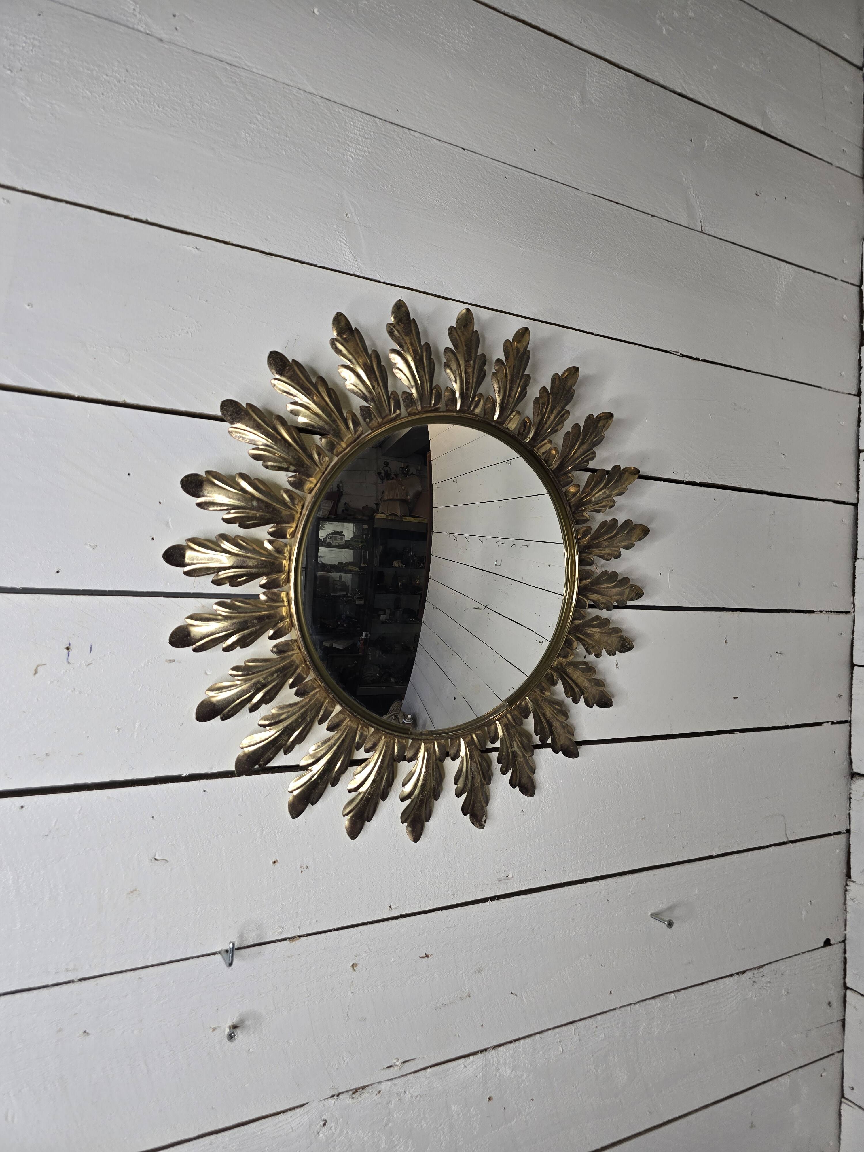 Witch's eye sun mirror in gold metal from the 60s