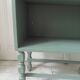 Small vintage bookcase enhanced in smoky green