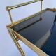 Vintage 1960's bar rolling table smoked glass gilded metal