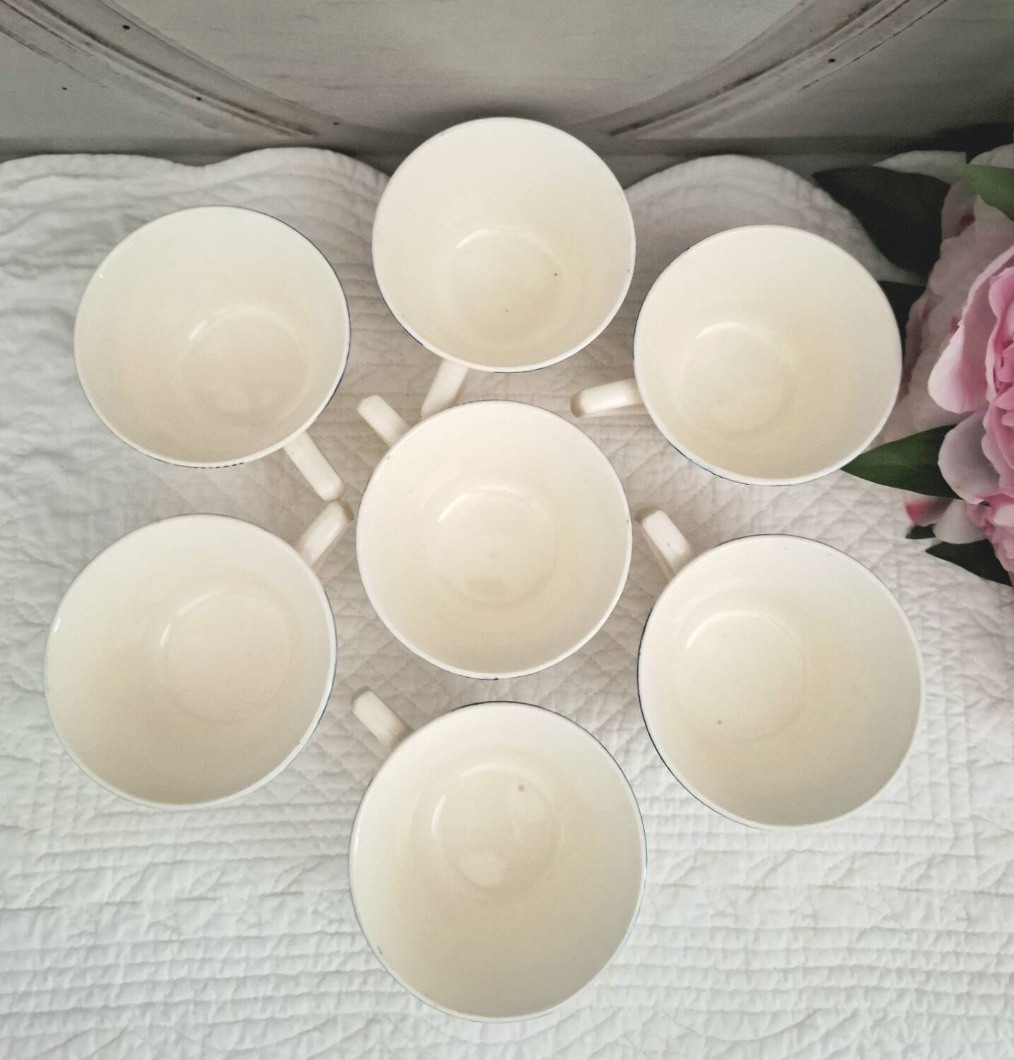 Antique cups with iron earthenware saucers