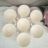 Antique cups with iron earthenware saucers