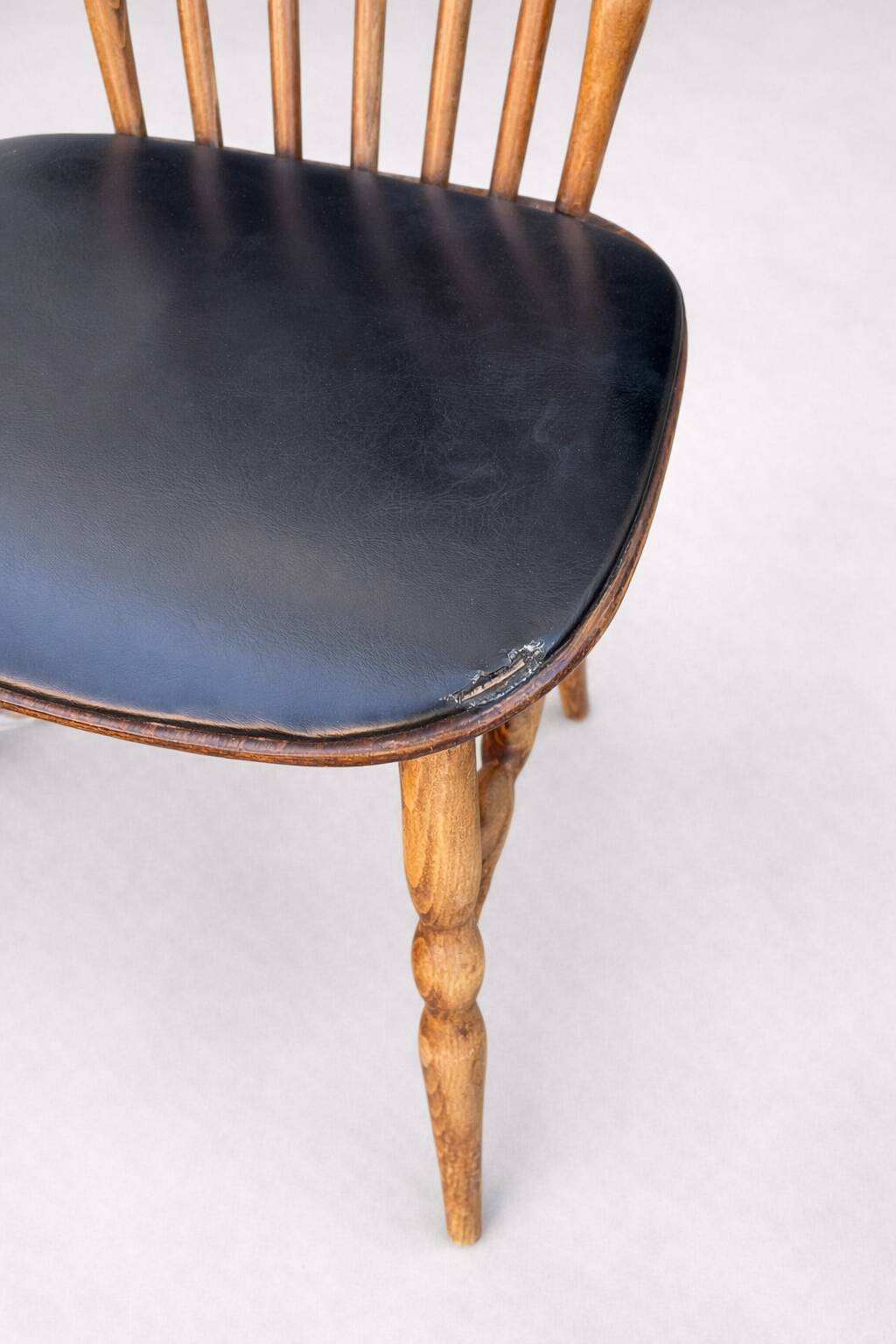 Set of 4 Baumann "Menuet" chairs – stained beech and black faux leather – French design