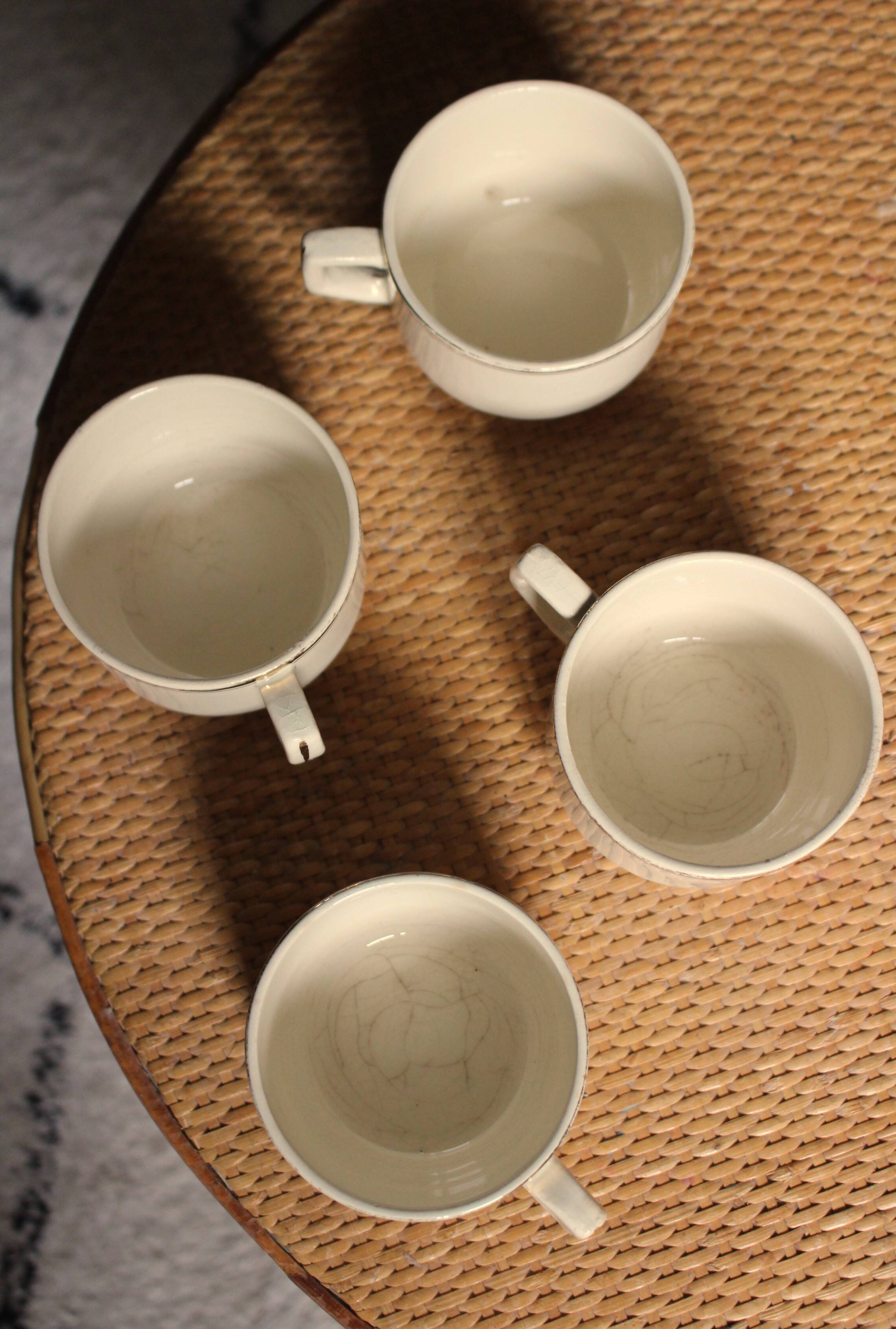 4 cups in ecru and gold Sarreguemines earthenware