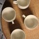 4 cups in ecru and gold Sarreguemines earthenware