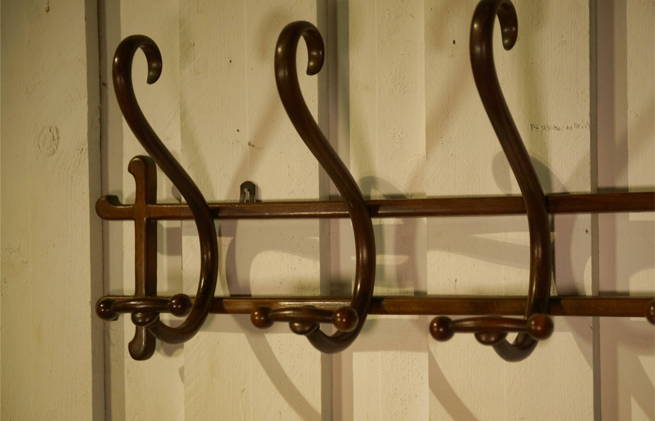 Curved beech wall coat rack published by Thonet, 1930s.