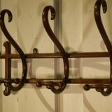 Curved beech wall coat rack published by Thonet, 1930s.