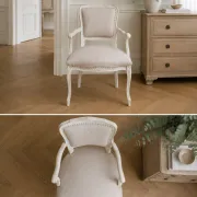 Louis XV style armchair, delicately patinated in a soft beige hue.