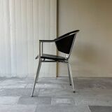 Set of four Italian black leather chairs, 1970