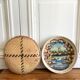 Wall composition of painted baskets