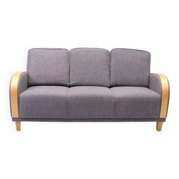 Three-seater Art Deco style sofa in grey fabric and curved wood.