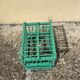 Vintage bird cage in green wood retro paint
