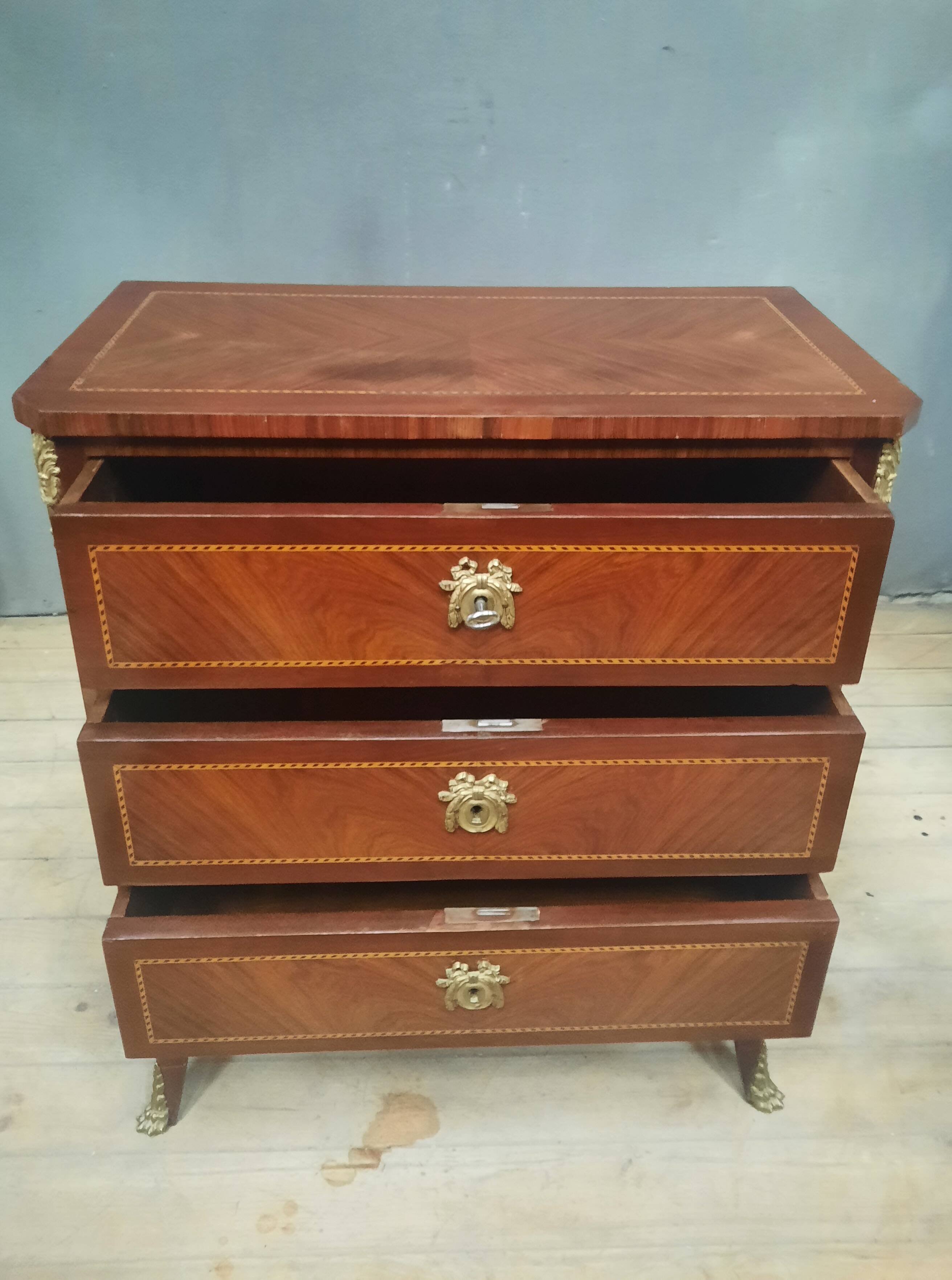 Small transitional style inlaid chest of drawers