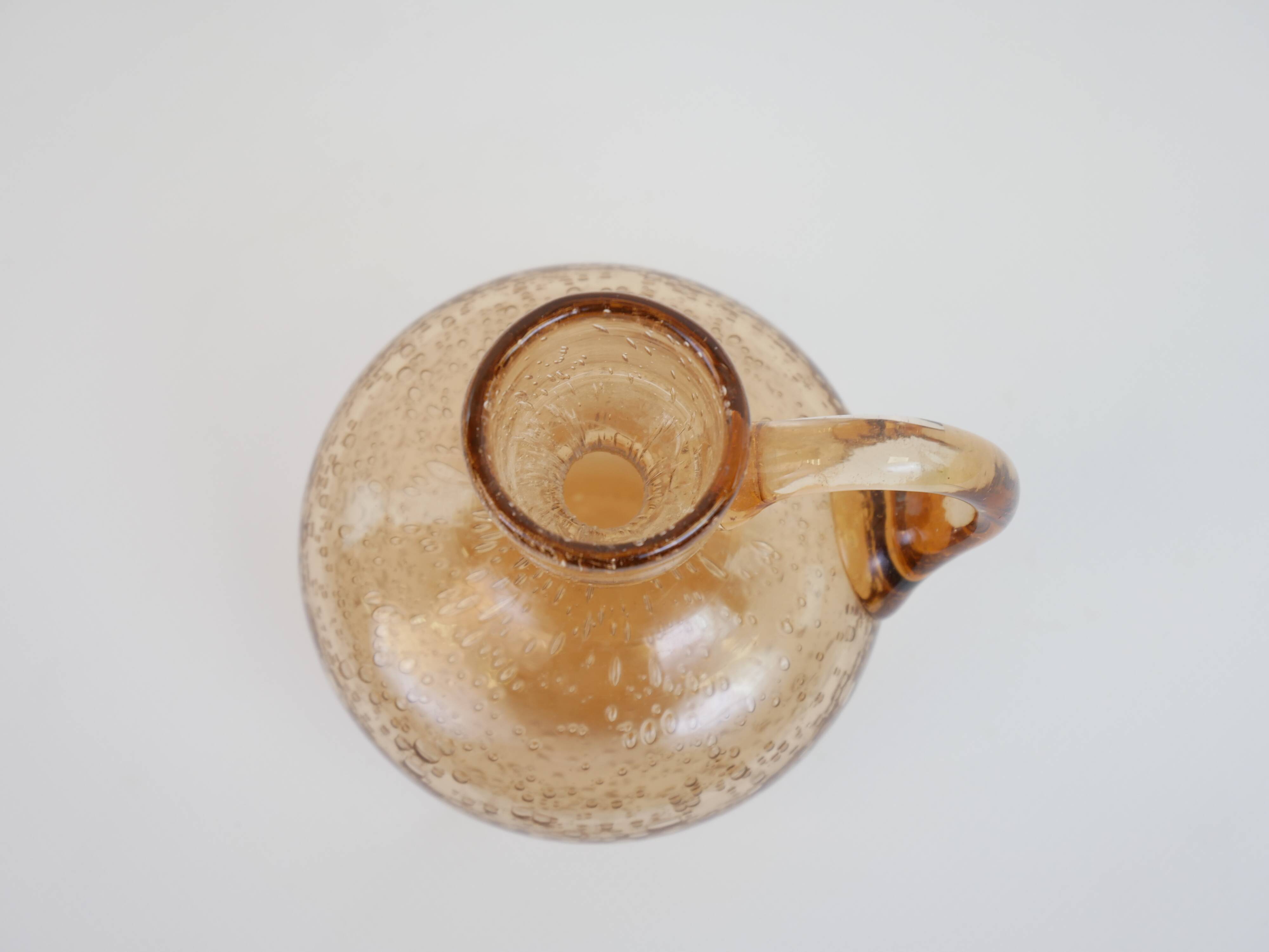 Petit porte bougie en verre bullé rose de Biot