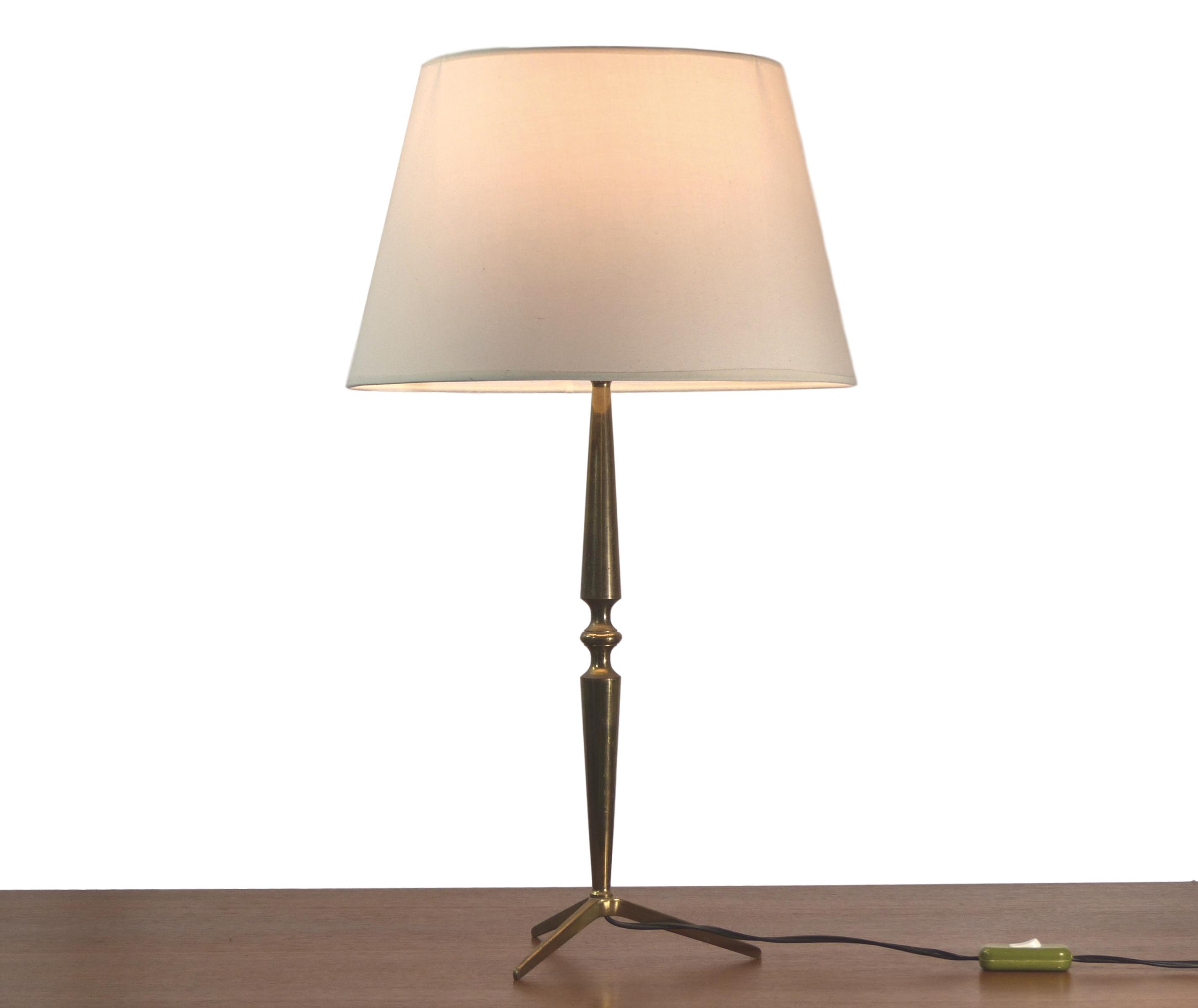 Golden brass tripod table lamp