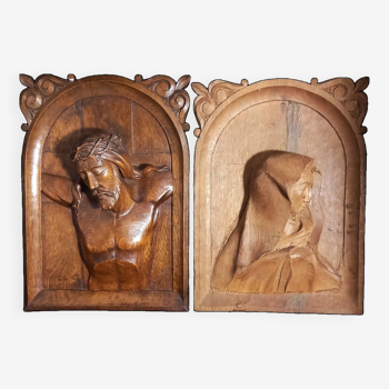 Pair of oak panels carved in high relief of Jesus and Mary (unfinished)