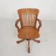 Oak office chair with adjustable spring system and height adjustment, 1950s.