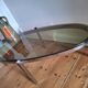 Vintage oval chrome and smoked glass coffee table, antique furniture