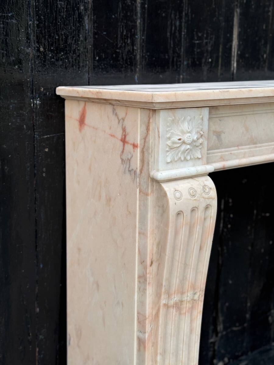 Louis XVI style fireplace in pink marble, circa 1920