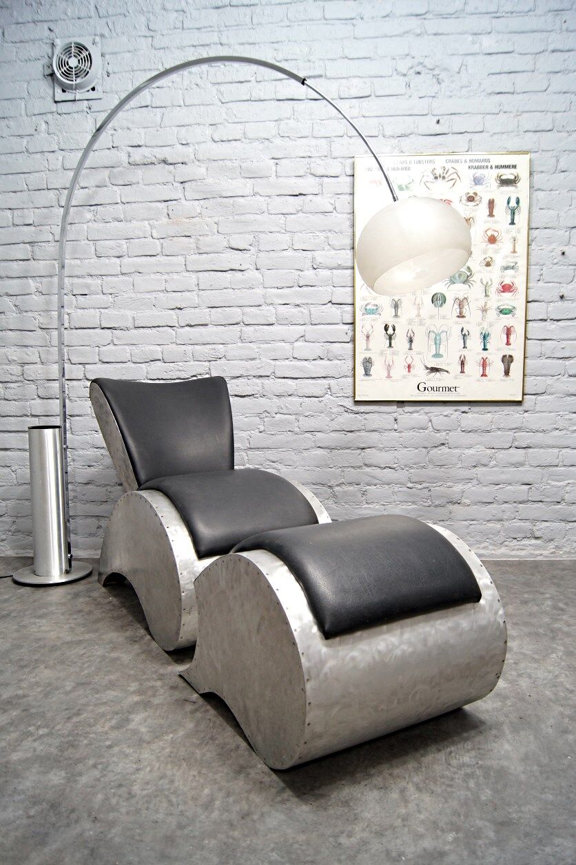 Industrial aluminum & vinyl lounge chair with footrest, 1970s