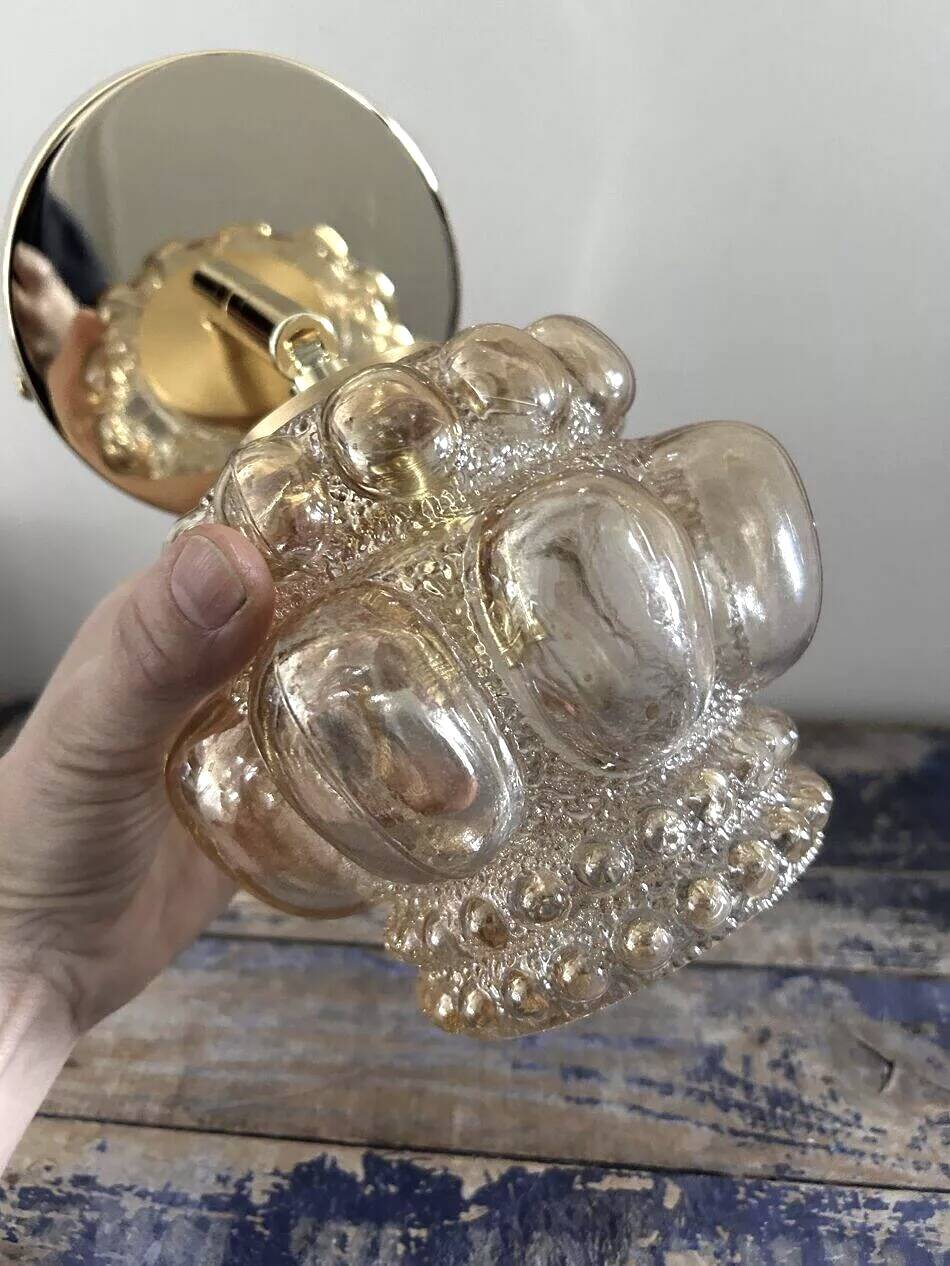 Gold tilting wall light