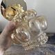 Gold tilting wall light