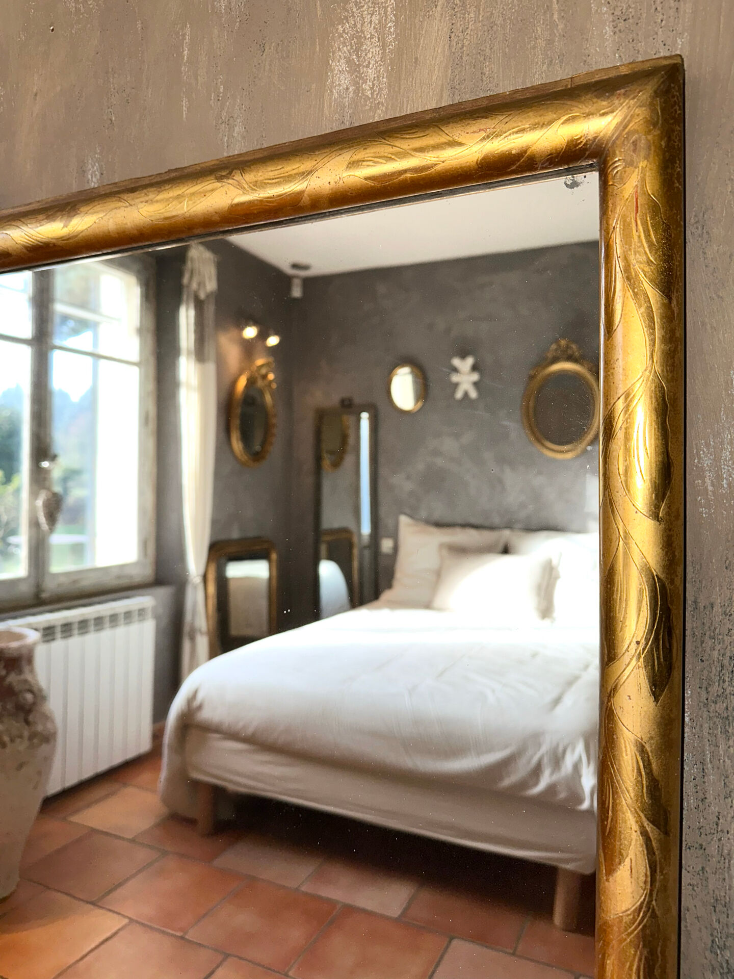 19th-century antique gilded mirror.