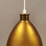 Old brass hanging lamp, which we believe is made from the drum of one of the very old coffee grinder