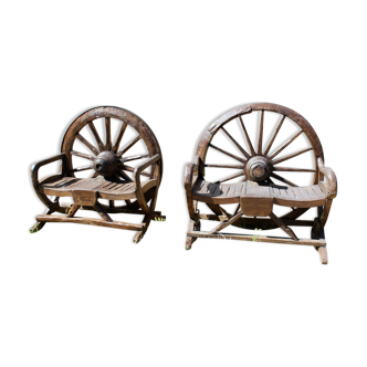 Pair of Double Benches with Wheel Decoration
