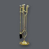 Antique fireplace tool in gilded zamak with duck head designs.