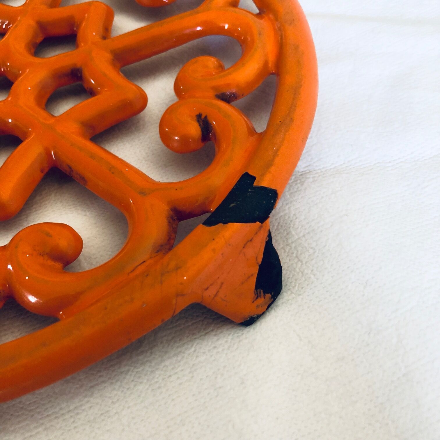 Dessous de plat en fonte orange