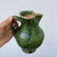 Green glazed terracotta pitcher / potter's ceramic vase