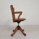 Oak office chair with adjustable spring system and height adjustment, 1950s.