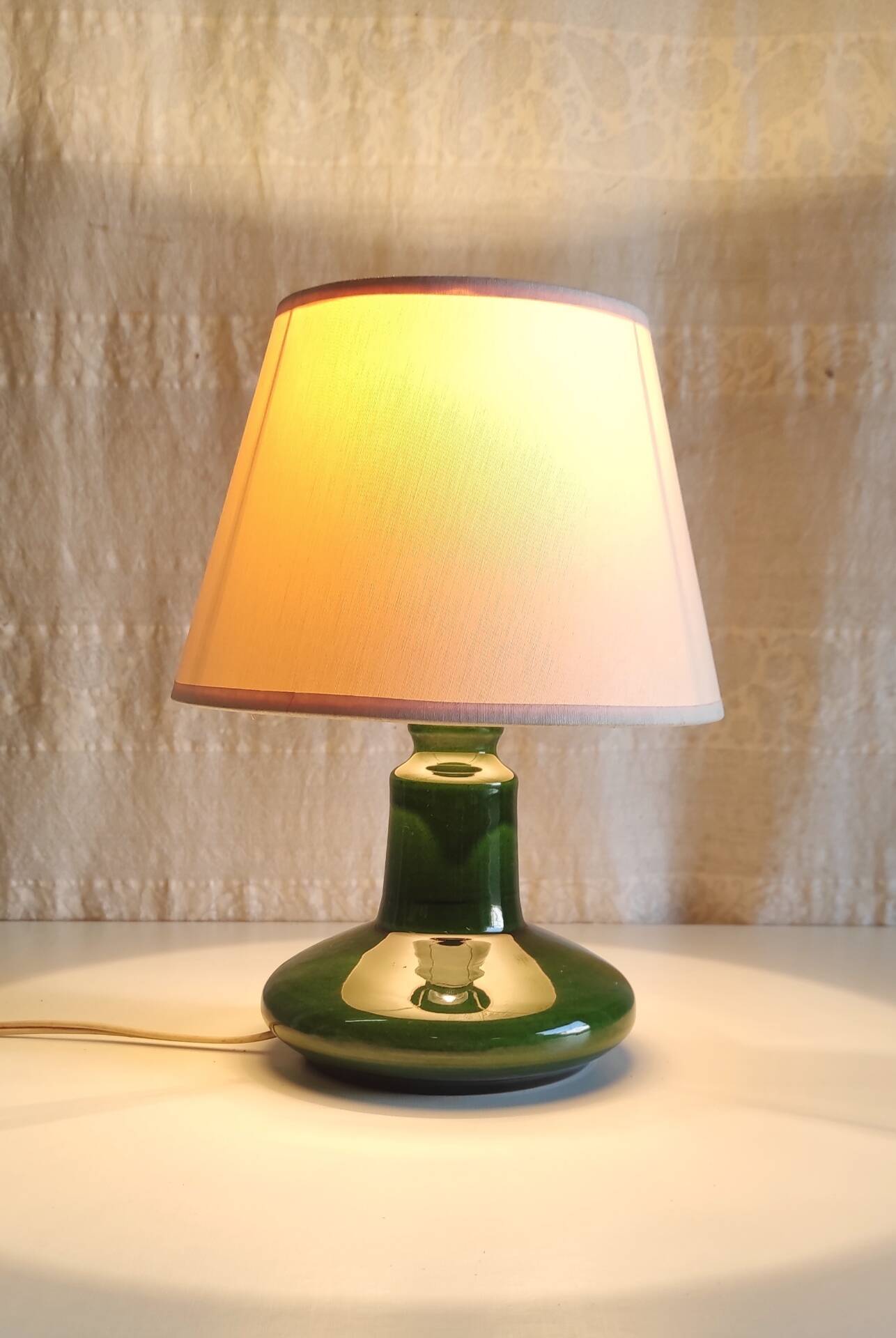 Green glazed ceramic table lamp base in Scandinavian style.