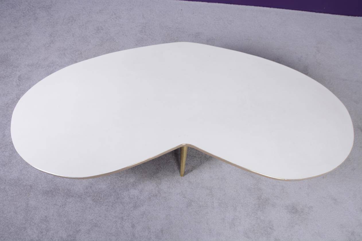 Free-form coffee table dating from the 60s,