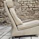 Boucle wool fireside chair and its 1970" vintage pouf