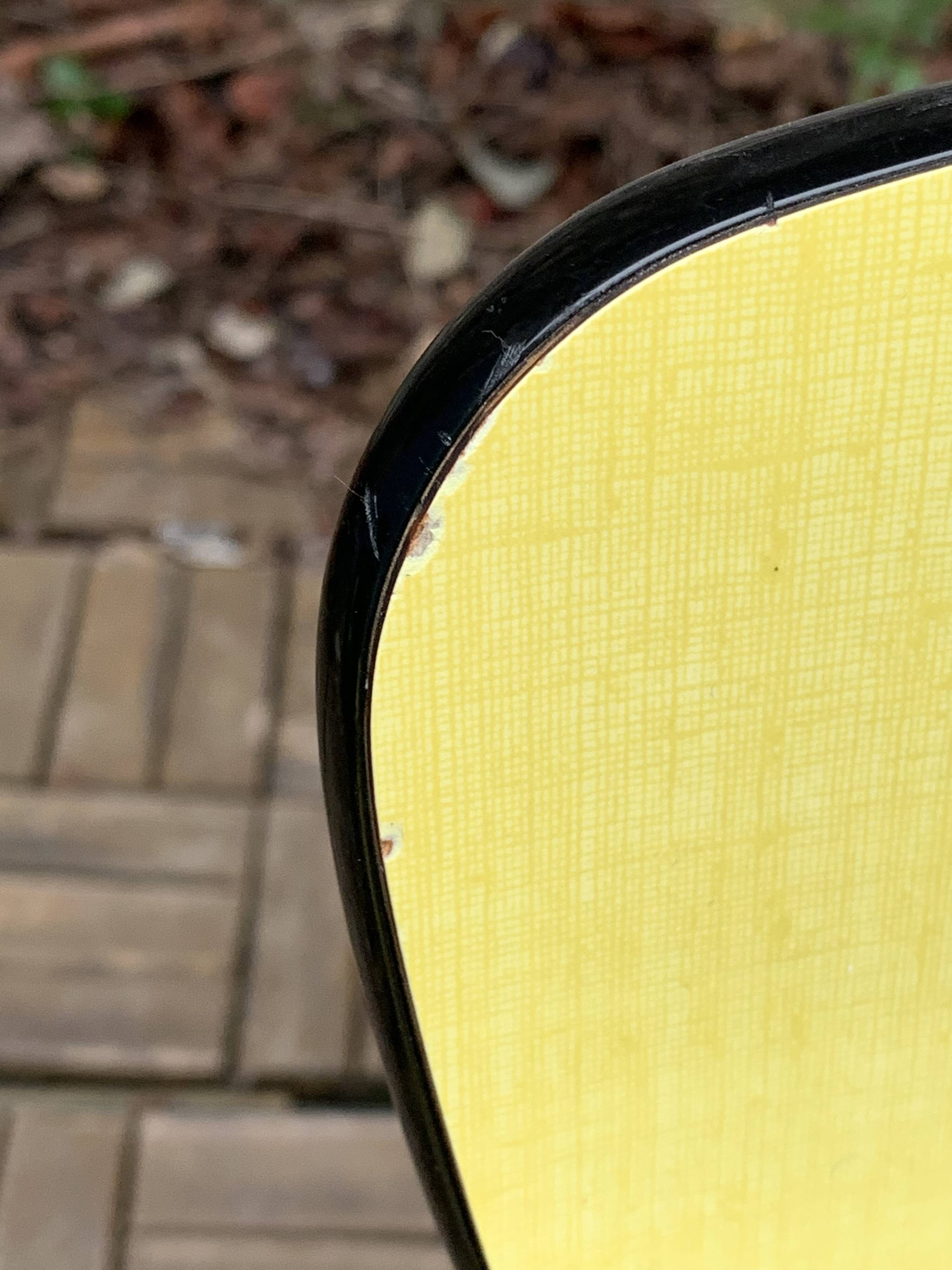 Yellow Formica chairs with compass legs, 1950s