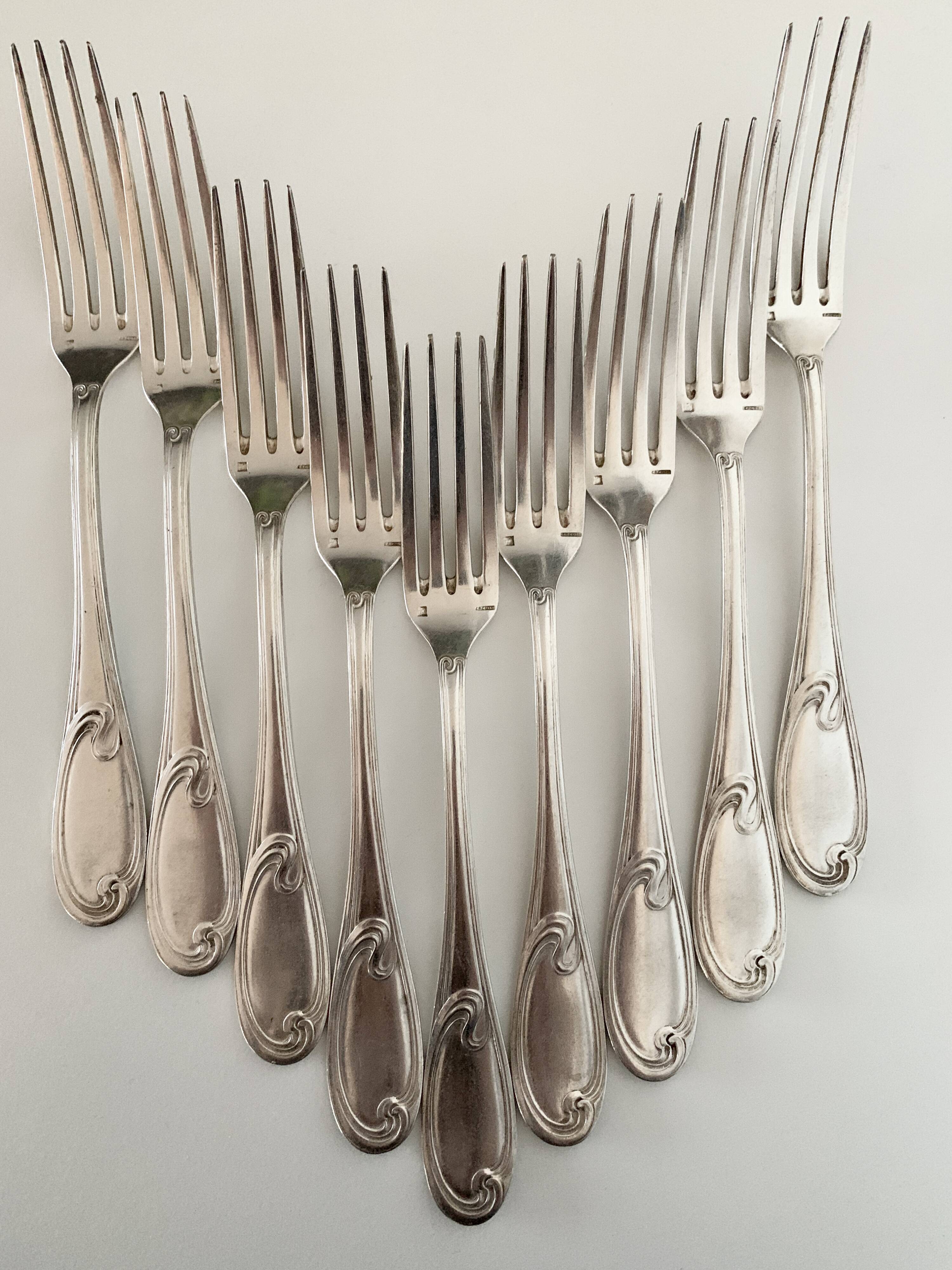 Nine large Ercuis silver-plated forks