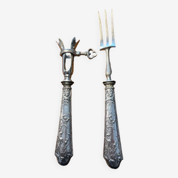 Leg tongs and fork in silver and metal art-nouveau period