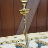 Pair of bronze candlesticks depicting a snake