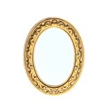 Small vintage wall mirror in gold resin